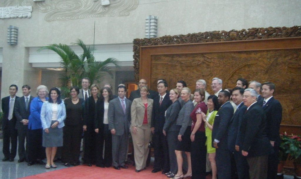 Group posing in a government building.
